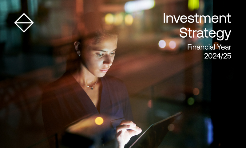 woman looking at tablet