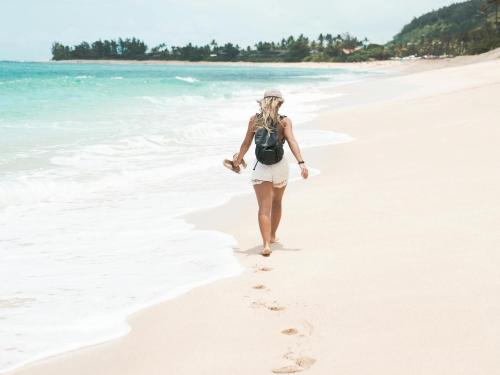 Woman walking on a beach